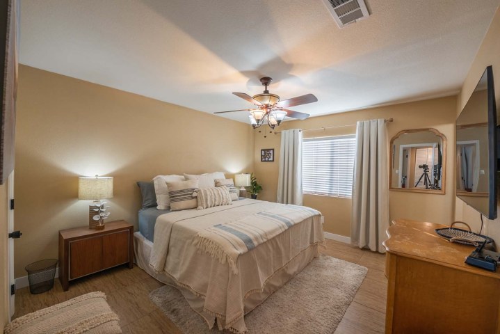 Large primary bedroom with king bed.